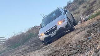 2023 Subaru Crosstrek offroad climbing and descending a very slippery and bumpy dirt hill [upl. by Cadmann]