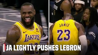 Ja Morant pushes LeBron James away after gamesealing dunk 👀  NBA on ESPN [upl. by Henleigh44]