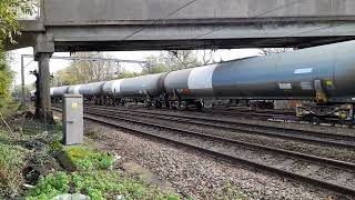 GBRf 66799Modern Railways passes cremorne lane on harwichnorth walsham tanks on 11122 [upl. by Fryd]