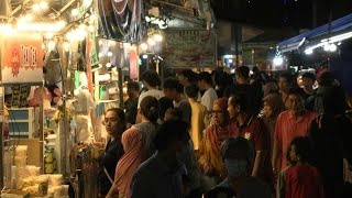 Crowds flock to Singapore Ramadan bazaar ahead of Eid AlFitr  AFP [upl. by Neeli224]