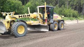 HBM BG190H4 Grader pushing some gravel [upl. by Che387]