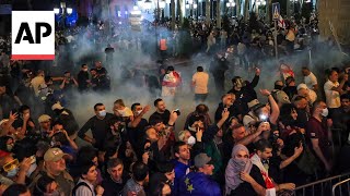 Police in Tbilisi disperse demonstrators outside Georgias parliament [upl. by Alodee626]