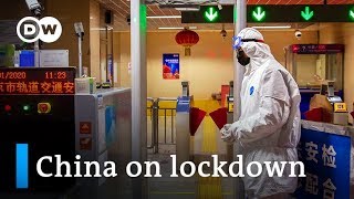 China puts millions under lockdown to contain coronavirus  DW News [upl. by Ecnedurp]