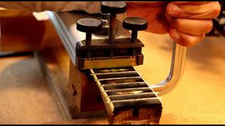 Fret press on Stelling Staghorn Banjo [upl. by Alegnaoj]