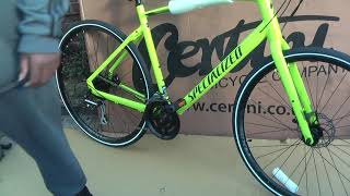 2021 Specialized Sirrus 20 Hybrid Bike Hyper Green unboxing [upl. by Eynenihc]