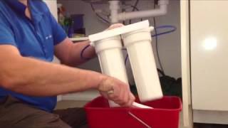 How to change water filter cartridges under sink [upl. by Nikolia]