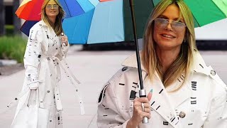 quotHeidi Klum Stuns in Chic White Coat amp Boots at AGT Auditions  Rainbow Umbrella Glamquot [upl. by Nica615]