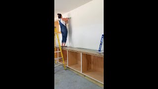 How To Hang Cabinets By Yourself [upl. by Ahsirtak742]