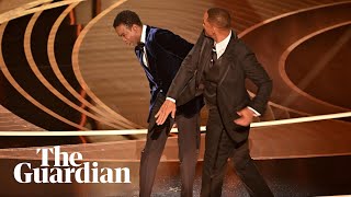 Watch the uncensored moment Will Smith smacks Chris Rock on stage at the Oscars drops Fbomb [upl. by Hardigg213]