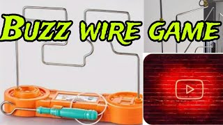 Buzz wire gamebuzz wire gameHow to make simple buzz wire game DIY Buzz wire game [upl. by Gussie]