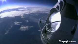 Daredevil skydiver Felix Baumgartner completes death defying leap from 18 miles up [upl. by Tiphany]