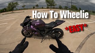 How To Wheelie ANY Motorcycle  Yamaha R7 Wheelie Tutorial [upl. by Velvet765]