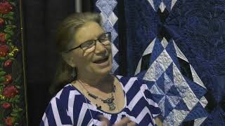 Joanne Lammert Shares Her Celestial Blues Quilt at AQS QuiltWeek  Branson [upl. by Stevana]