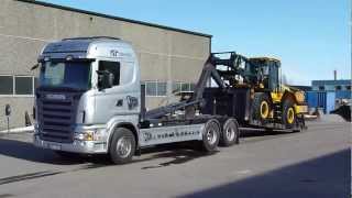 Scania R420 Hook lifter unloading a new JCB426E Weelloader [upl. by Merissa]