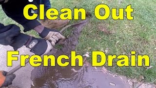 How To Snake and Clean Out a French Drain [upl. by Yesnnyl]