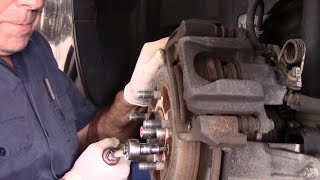 How To Replace Rear Brake Pads And Rotor On A 2013 Ford Explorer [upl. by Anertal]