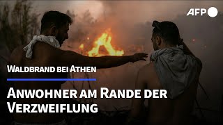 quotDas Feuer kommt von überallquot Anwohner entsetzt über Waldbrand bei Athen  AFP [upl. by Ver]