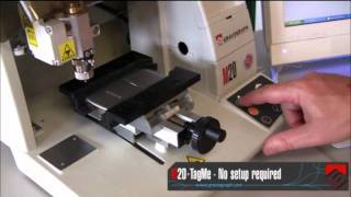 Gravograph M20 Machine Engraving a Cell Phone with TagMe Software [upl. by Eicarg]