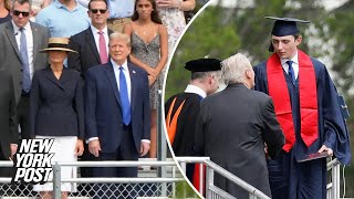 Towering Barron Trump walks at high school graduation as proud parents Donald and Melania look on [upl. by Llerahs]