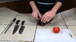 How to Sharpen a Knife with a Whetstone Wusthof TriStone Demonstration [upl. by Etireugram]