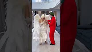 The Joker broke the wings of the angel in white and gave them to Harley Quinn cosplay [upl. by Aicarg]