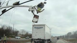 Truck crash sends worker flying out of construction bucket [upl. by Jacquenetta]