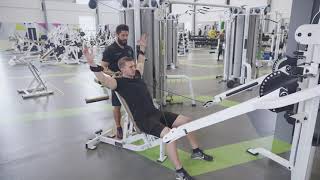 Seated Crucifix Cable Cuffed Lateral Raise  Exercise Tutorial [upl. by Stanfill]