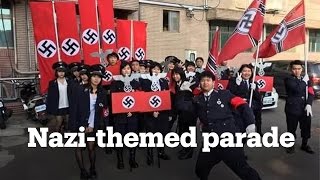 High school in Taiwan puts on Nazithemed Christmas parade [upl. by Annirak]