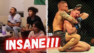 HILARIOUS Reaction to Dustin Poirier and Michael Chandlers INSANE WAR at UFC 281  Throwback fight [upl. by Farrow]