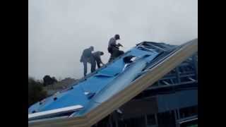 Installing roofing foil as sarking on a metal framed roof [upl. by Oniotna]