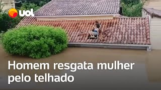 Chuvas no RJ Homem resgata mulher pelo telhado em Campos de Goytacazes [upl. by Kolk]