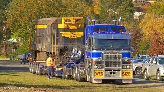 Loading ATVs on a Load Trail Single Axle Trailer with Front Ramp Gate and Rear Fold Gate [upl. by Areis747]