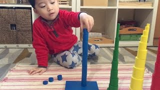 Montessori Materials Knobless Cylinders Building Towers Activity [upl. by Janessa]