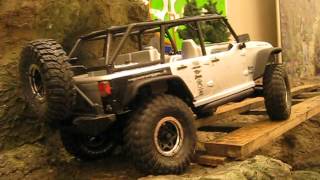 Axial SCX10 Jeep Wrangler Unlimited Rubicon Demo Trail at Portland International Auto Show 2013 [upl. by Nageek]