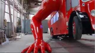 London doubledecker bus does pushups in preparation for Olympics [upl. by Ynalem]