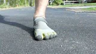 Forefoot Strike in Vibram Fivefingers  Super Slow Motion [upl. by Mur197]