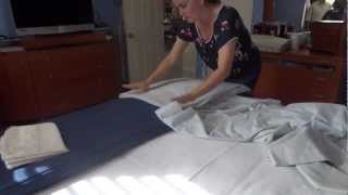 Folding and organizing bedding sheets [upl. by Lrat]