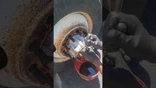 How remove an axle on semi truck with wedges around the studs [upl. by Hploda]