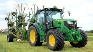 Raking grass with a New John Deere 6125R  Krone Swadro 1400 Plus [upl. by Torres153]