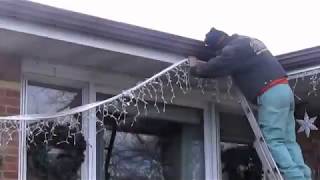 Hang Christmas Lights Fast and Easy No clips [upl. by Llednar]