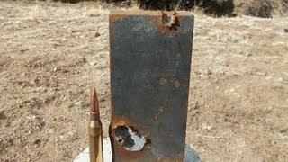 Savage 110 BA 338 Lapua Magnum vs 1quot Steel [upl. by Koloski]