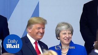 Donald Trump and Theresa May pose for photos at NATO summit [upl. by Vanthe]