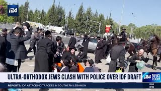 UltraOrthodox Jews riot outside of main IDF drafting center [upl. by Nosremaj1]