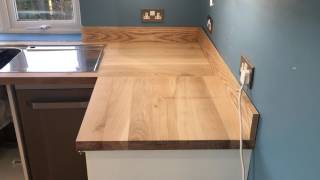 Solid oak worktop installation supplied by Worktops express [upl. by Scriven]