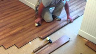 How to install Pergo laminate flooring [upl. by Ydasahc]