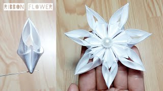 Kanzashi ribbon flower tutorialSatin ribbon craftRibbon flowers easyDiy flower making [upl. by Gorrono]