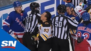 Brad Marchand Receives Helmet Popping Cross Check From Pavel Buchnevich [upl. by Temp]