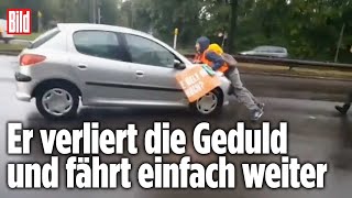 KlimaDemo eskaliert Fahrer schleift KlimaChaoten mit [upl. by Illyes471]