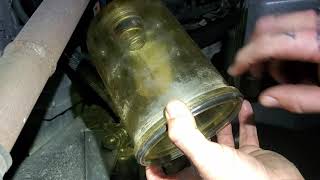 How to change a fuel water separator Davco filter on a Kenworth T680 w a PACCAR MX13 motor [upl. by Ahsataj869]