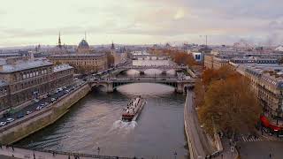 BRIDGES GOING OVER THE RIVER SURROUNDED BY BUILDINGS AERIAL 4K [upl. by Thorsten]